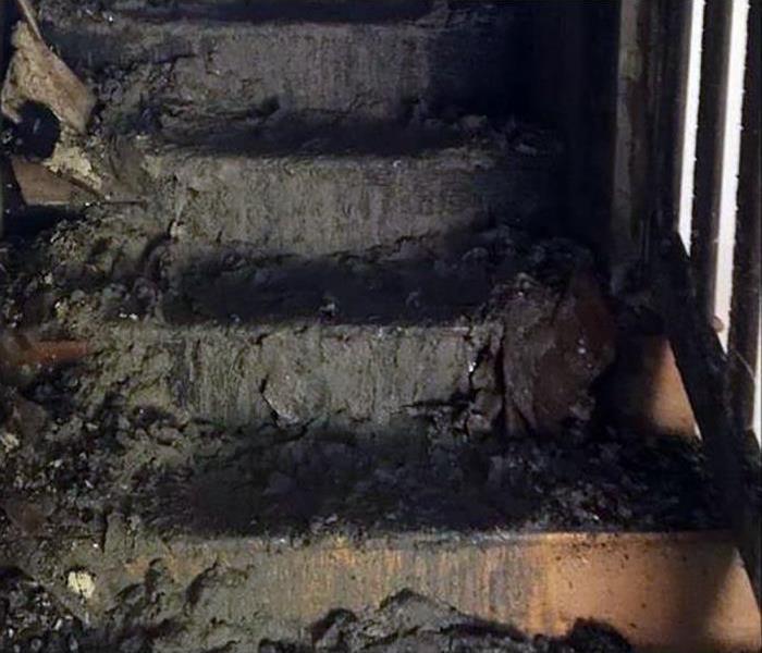 soot and fire damaged stairs